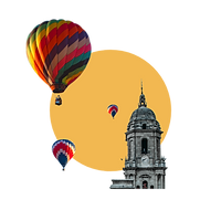 Hot air balloons floating beside a domed city tower
